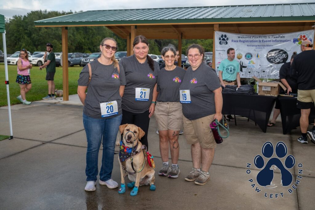 Group at a Disruptive Endeavors event, Pawfields 5k. Support Disruptive Endeavors.