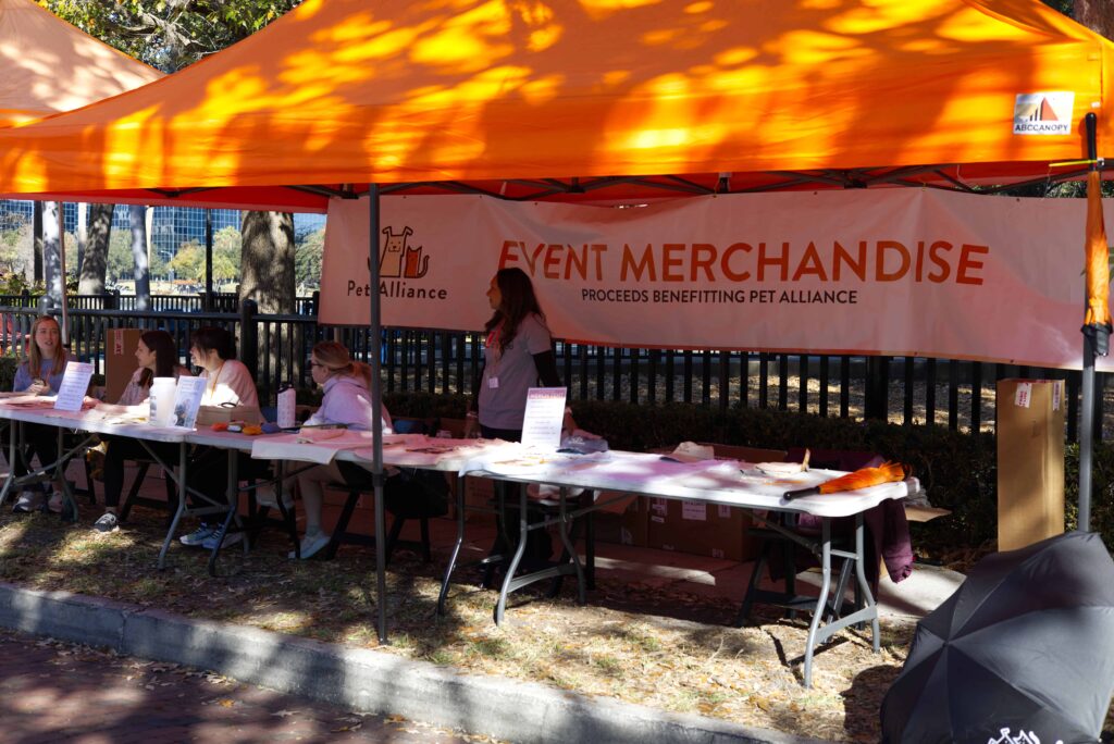 Volunteers at a booth at a Apopka Disruptive Endeavors event